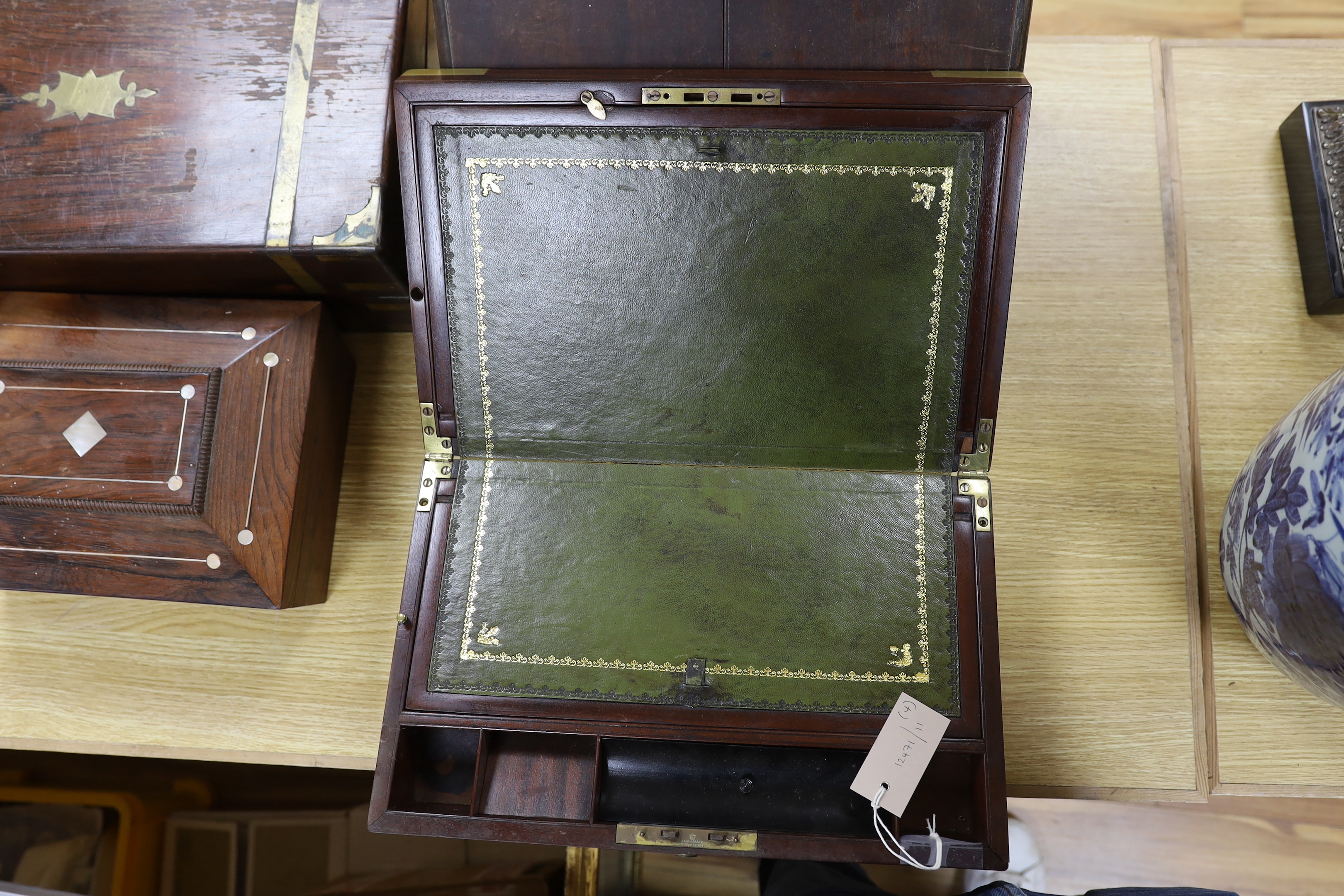 Two 19th century brass mounted writing slopes, a stationery cabinet and a work box